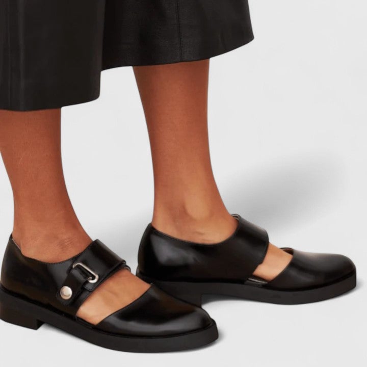 Side profile of Erin elegant black shoes showing classic design and sleek finish