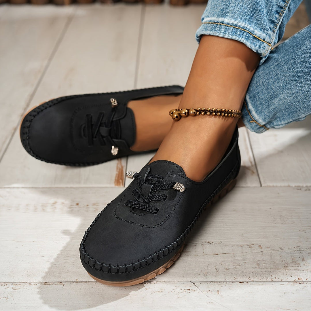 Pair of Evelyne loafers in brown from above showing full silhouette