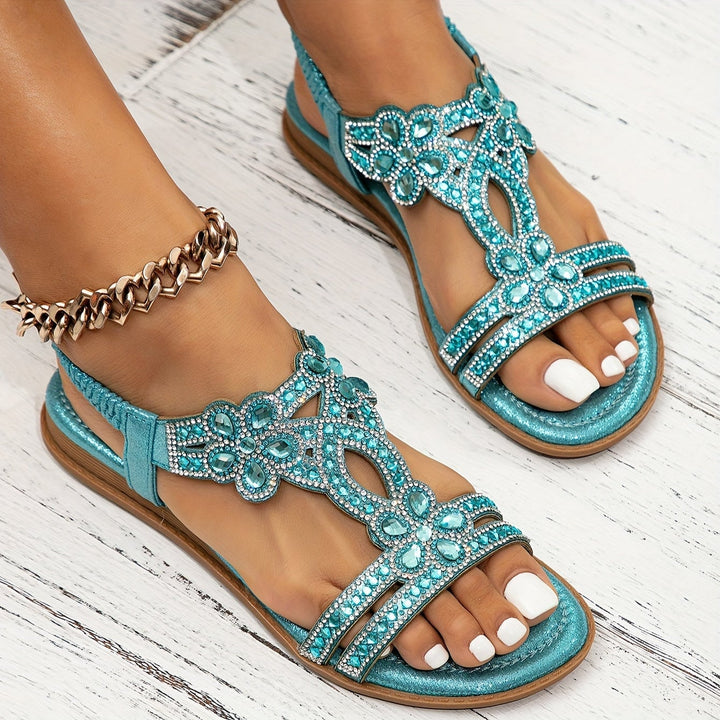 Faye orthopedic sandal in silver on a neutral background