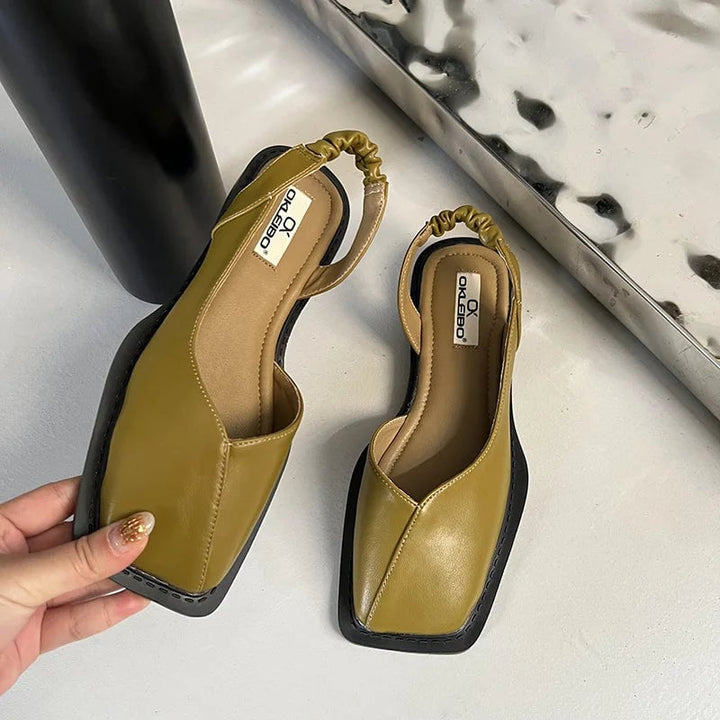 Flat lay of all four Felicity orthopedic slip-on colorways: beige, black, zebra, green