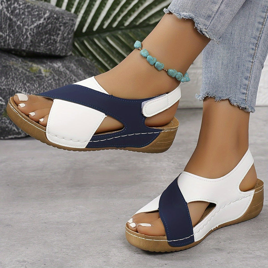 Flavia women's adjustable walking sandal in blue, side profile view