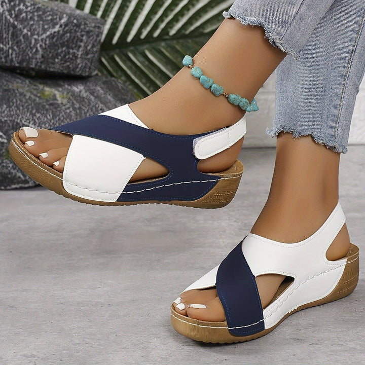 Flavia women's adjustable walking sandal in blue, side profile view