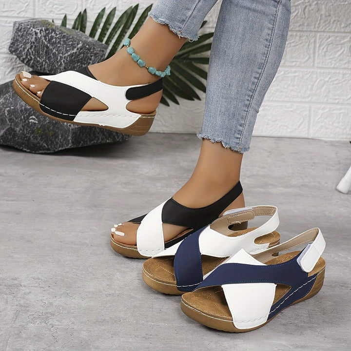 Flavia women's adjustable walking sandal in black, front view