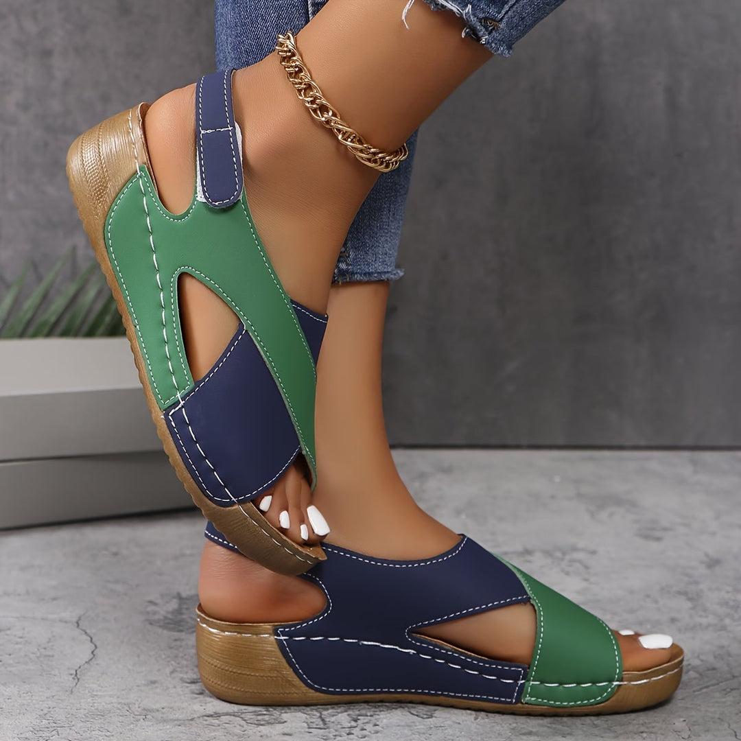 Close-up of Flavia sandal adjustable strap detail and cushioned footbed