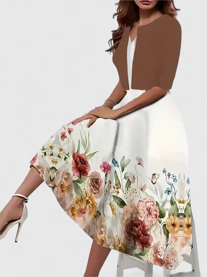 Flora floral midi dress in blue, side profile highlighting the sweeping midi length and 3/4 sleeves