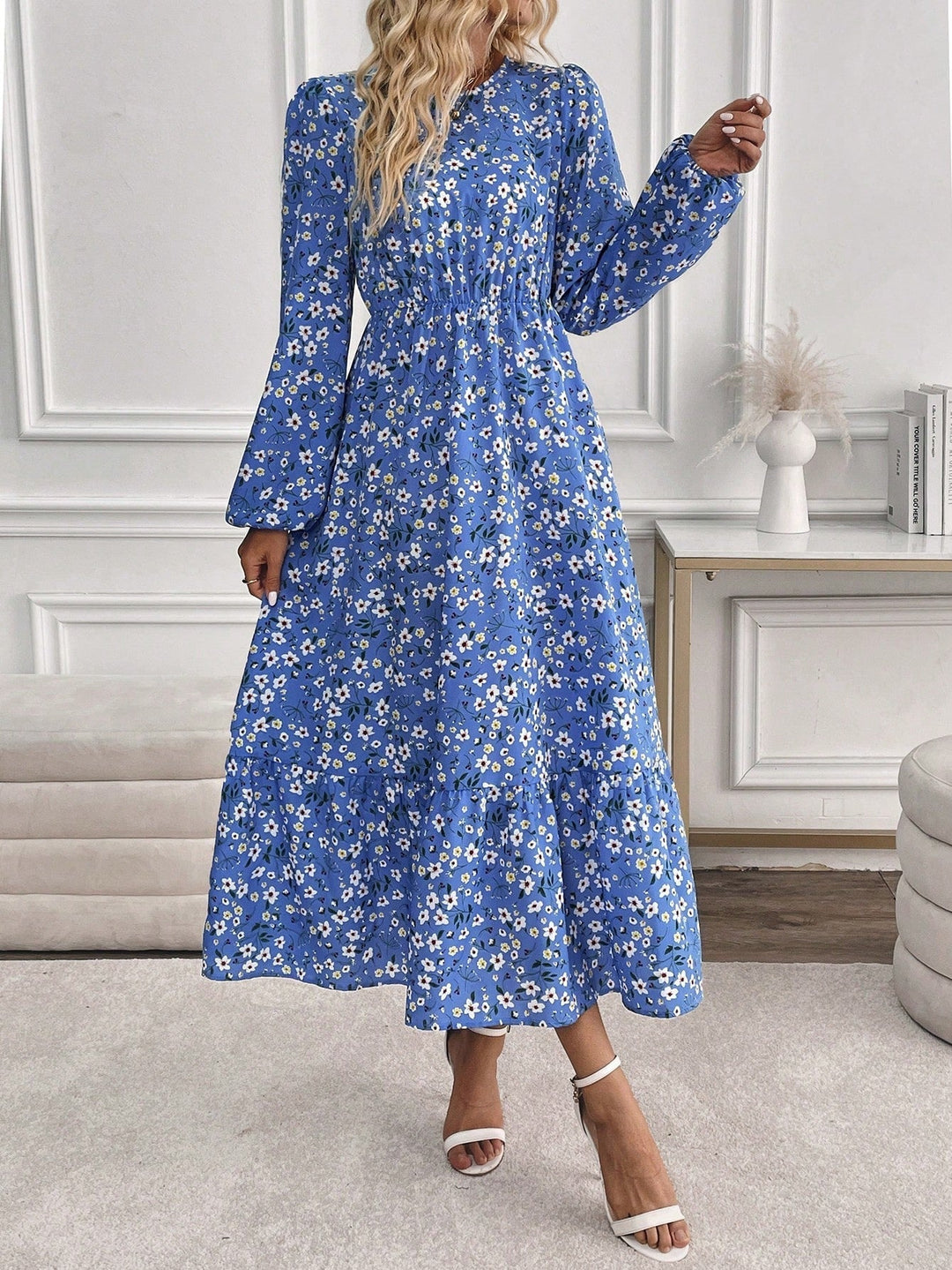 Flora maxi dress in blue floral print, full-length front view on model