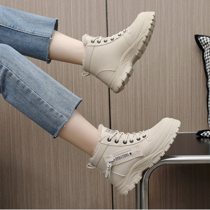 BobaFashion Freya comfort boots worn with jeans tucked in for a street style look
