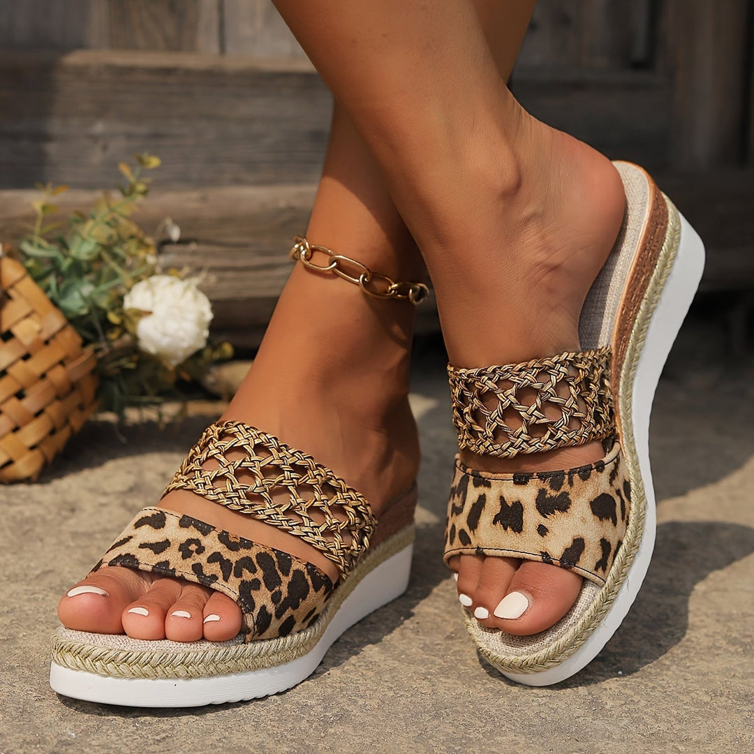 Freya woven wedge sandals in light brown with intricately woven straps, side view