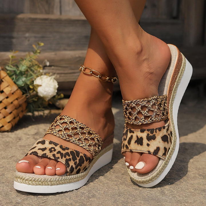 Freya woven wedge sandals in light brown with intricately woven straps, side view