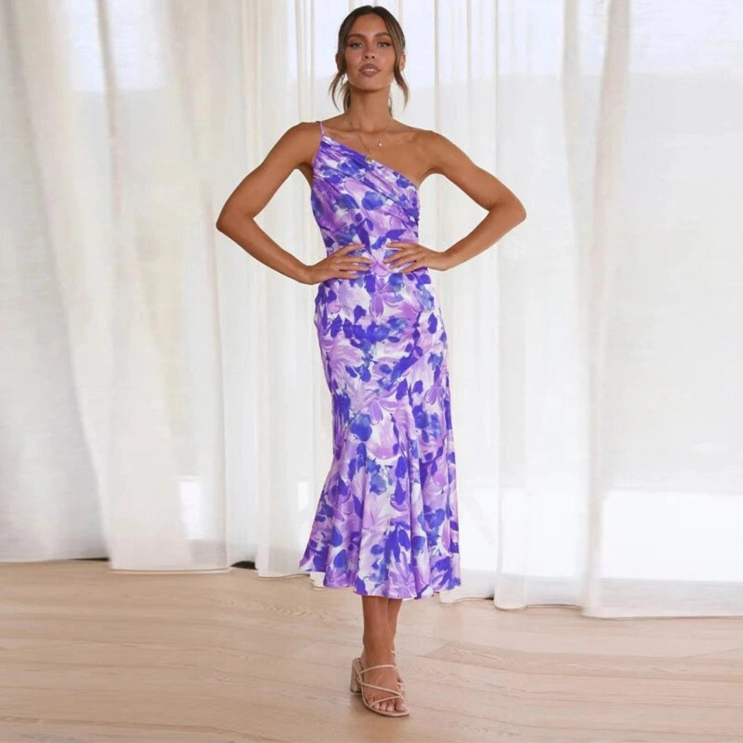 Side profile of the Genevieve midi dress highlighting the flattering midi length and breezy fabric