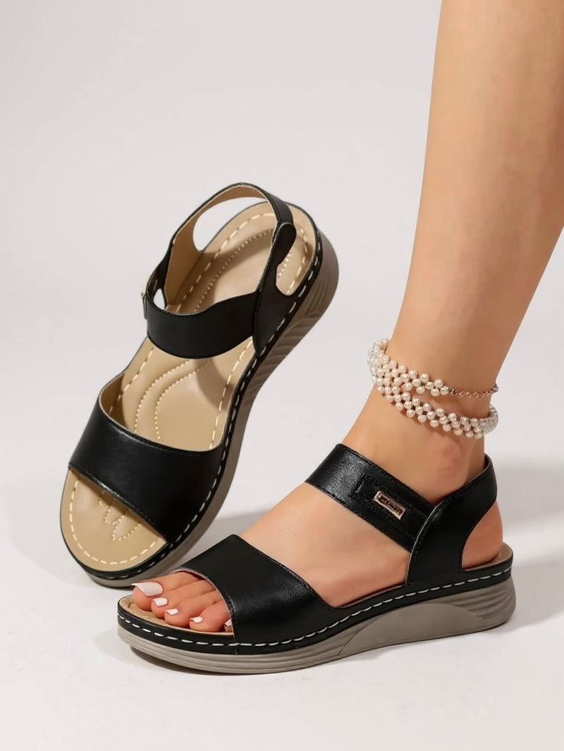 Close-up of the padded insole and flexible sole on the Giselle sandals