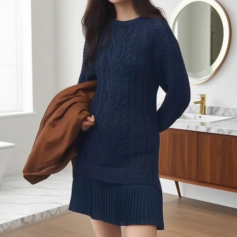 Grace sweater dress in Gray, offering a soft neutral tone ideal for layering and everyday wear