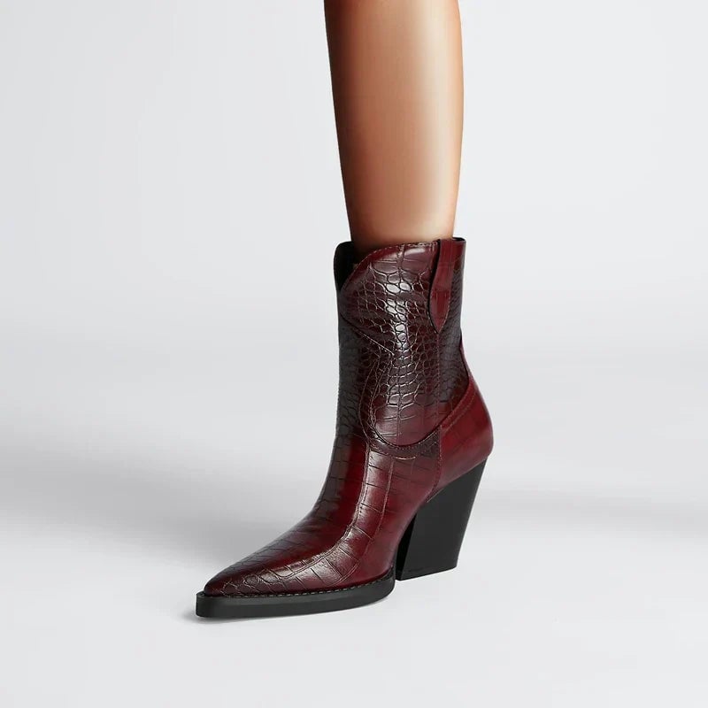 Women's western-inspired ankle boot in wine red with subtle stitching detail, side view