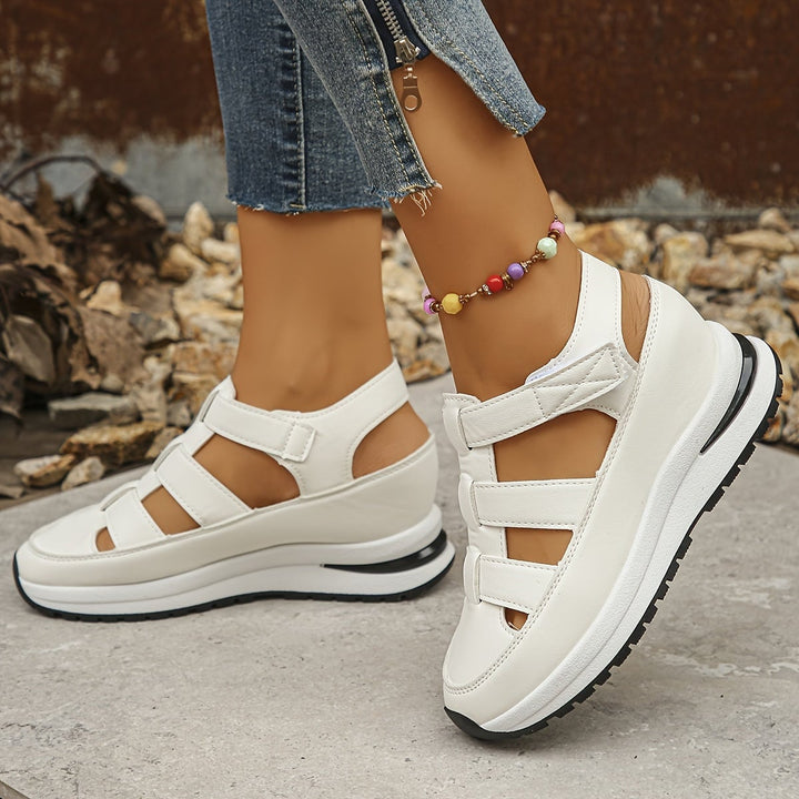 Model wearing Harlow white platform sandals with a casual summer outfit