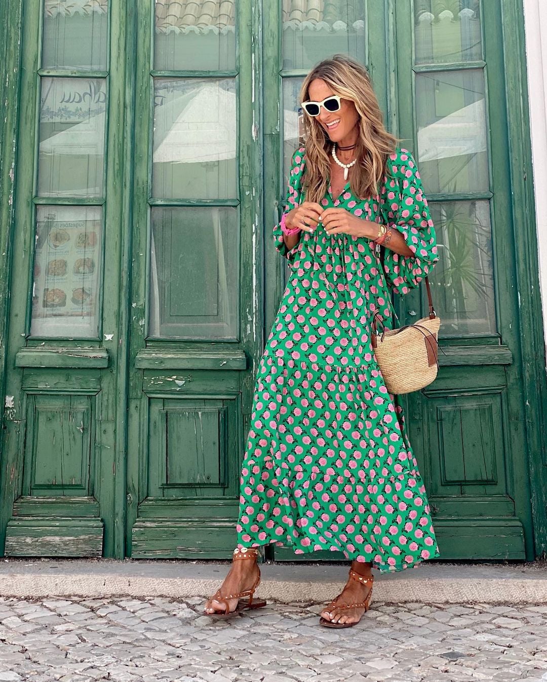 Front view of the BobaFashion effortless spring dress in green and white on a model