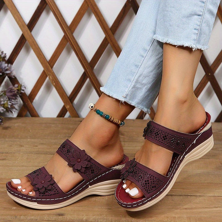 Pair of Heath wedge slides in burgundy and black side by side