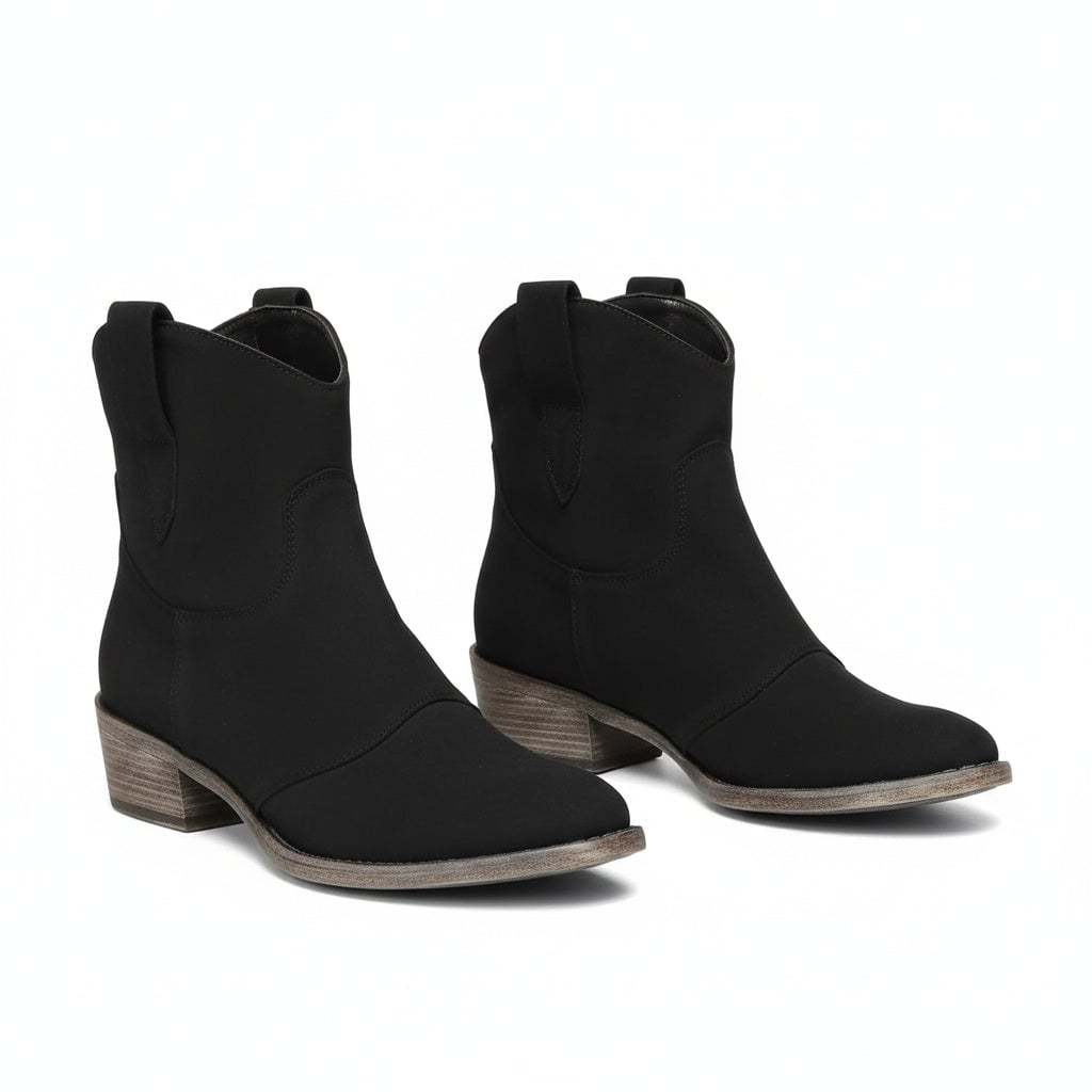 Close-up of Henny cowboy ankle boot toe and Western stitching detail