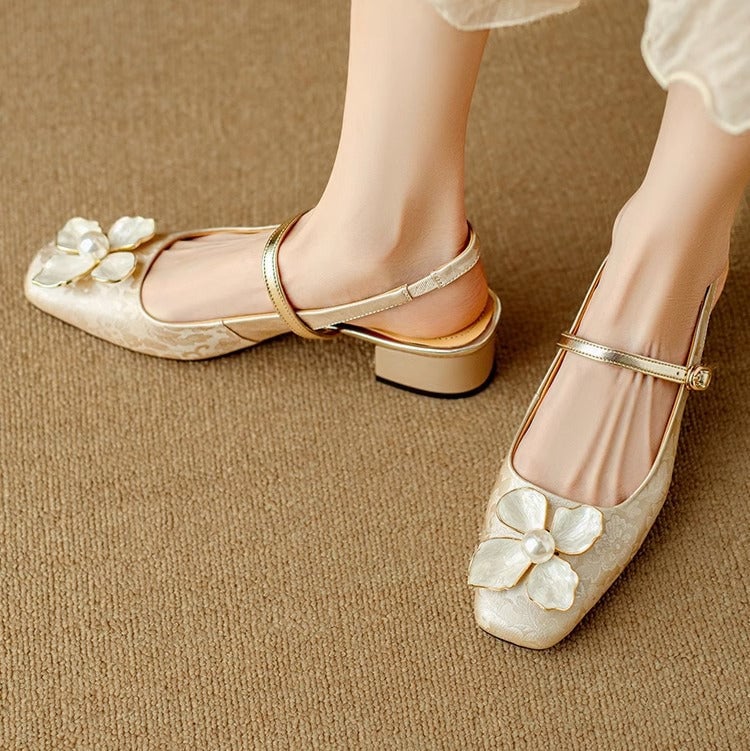 Isabeau floral mary jane pumps in beige, rear view showing block heel and ankle strap buckle