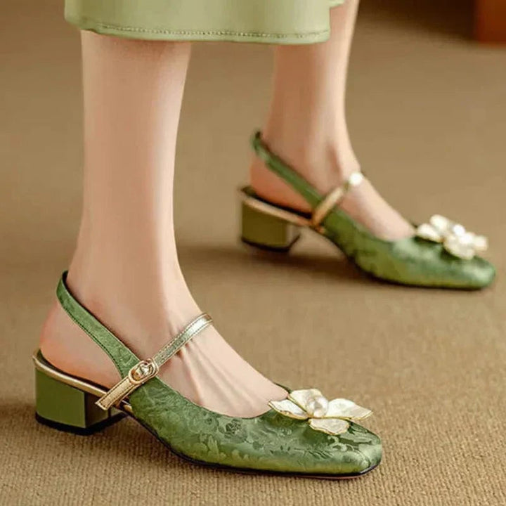 Isabeau floral mary jane pumps in green with pearl floral embellishment and block heel, front view