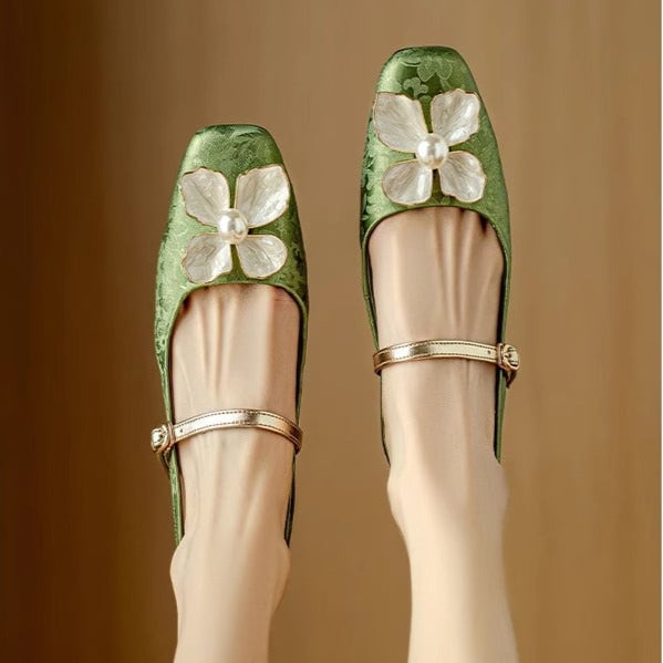 Isabeau floral mary jane pumps in green, top-down view highlighting jacquard fabric pattern
