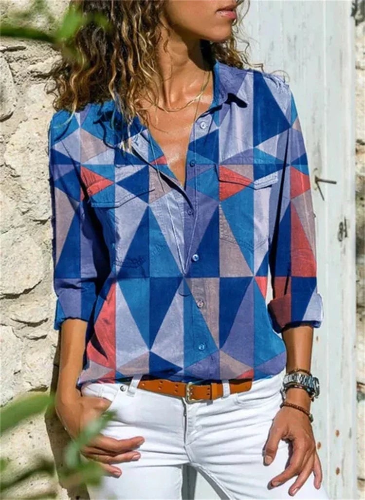 Close-up of the point collar and top button detail on the Isabelle floral blouse