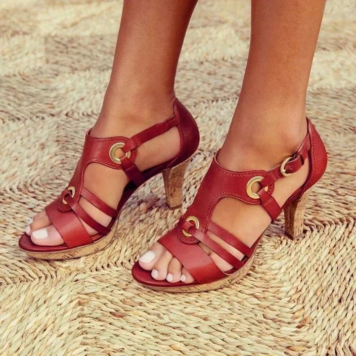 Flat lay of all five Jane heel color options: grey, green, brown, red, and black