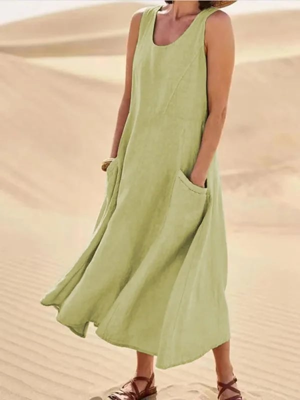 Jenny everyday dress in light blue, modeled with a relaxed stance