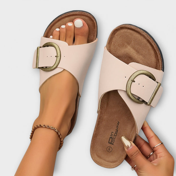 Pair of Joanna comfort sandals in khaki styled with a flowy midi dress, lifestyle shot