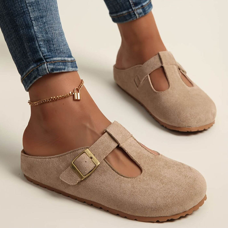 Top-down view of BobaFashion Juniper yellow buckle clogs showing footbed and strap