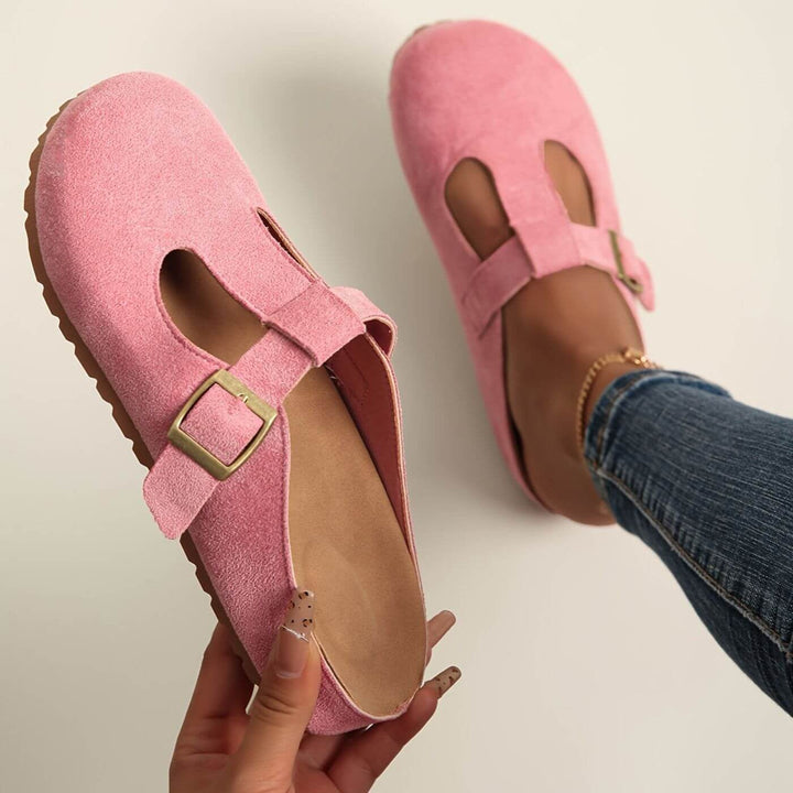 BobaFashion Juniper clogs in pink colorway with adjustable buckle strap, flat lay