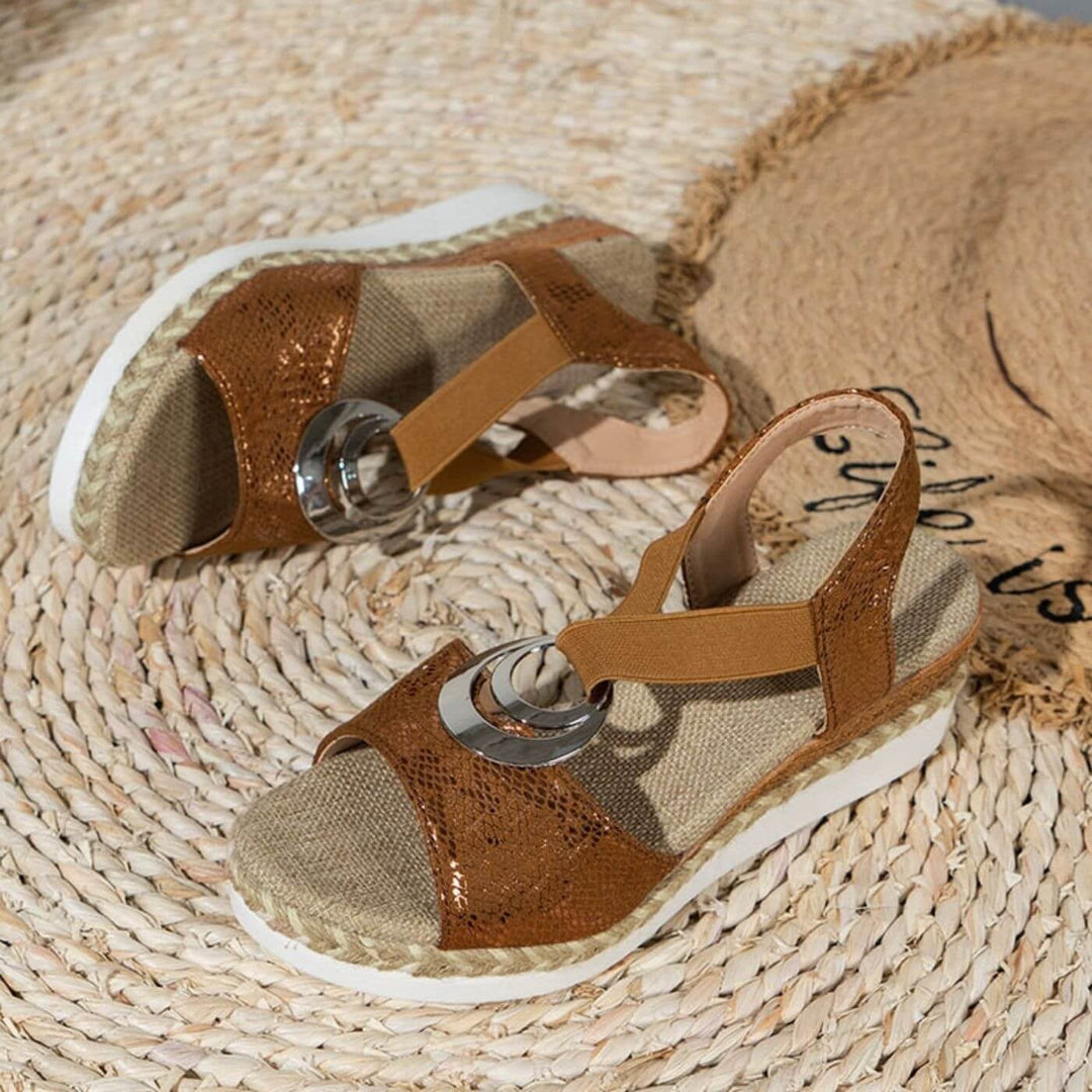Pair of women's comfortable orthopedic sandals in black shown side by side on a light background
