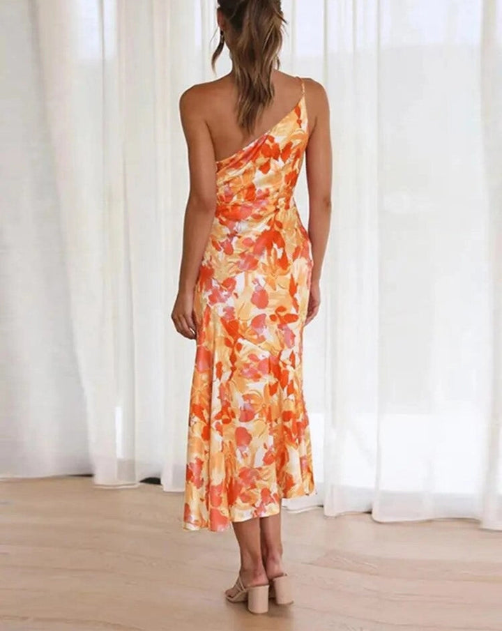Purple floral one-shoulder maxi dress, full-length front view on a model