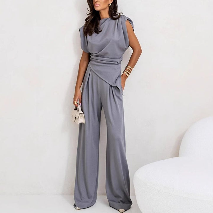 Full-length front-facing shot of the Khloe two-piece set in khaki on a model