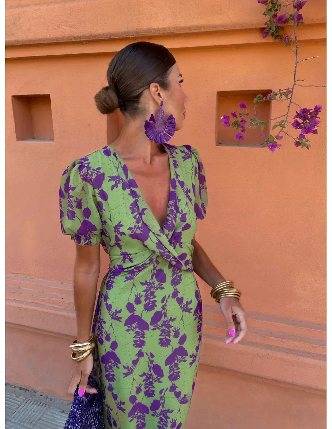 Woman styling the green BobaFashion summer dress with sandals for a casual daytime look