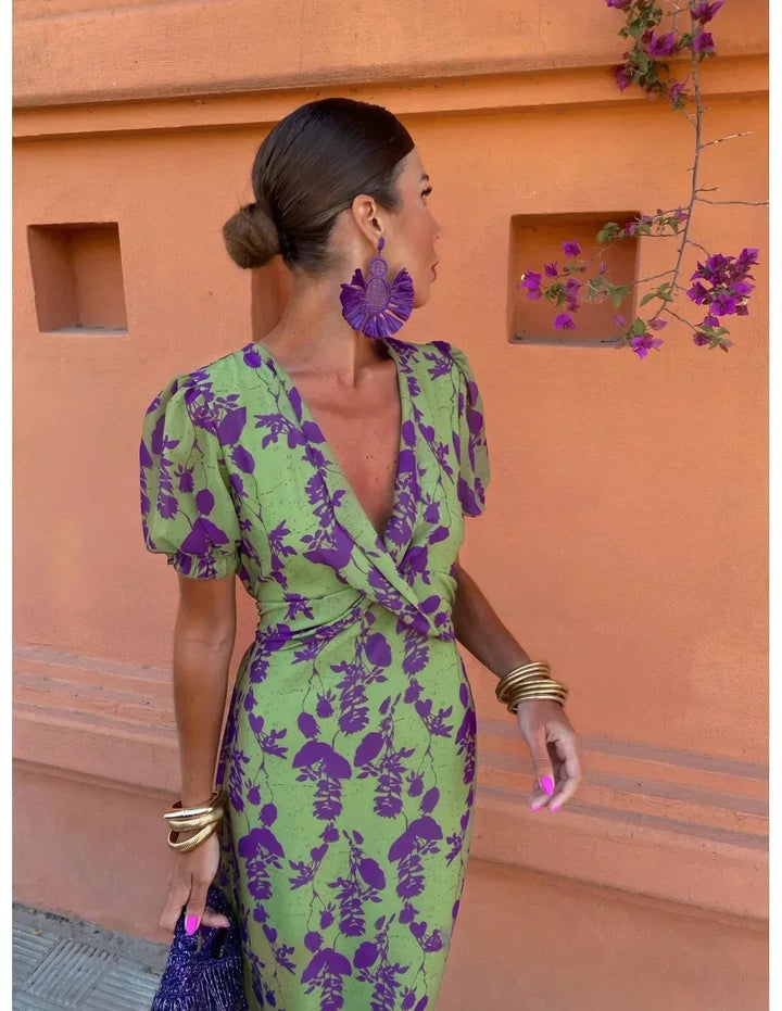 Woman styling the green BobaFashion summer dress with sandals for a casual daytime look