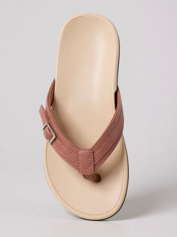 Lantana slip-on thong sandals in pink styled with a summer outfit, lifestyle shot