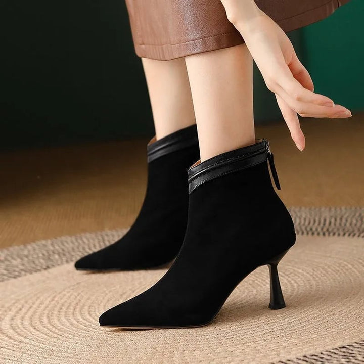 BobaFashion Laura ankle boots in black with a smooth contoured silhouette, side view