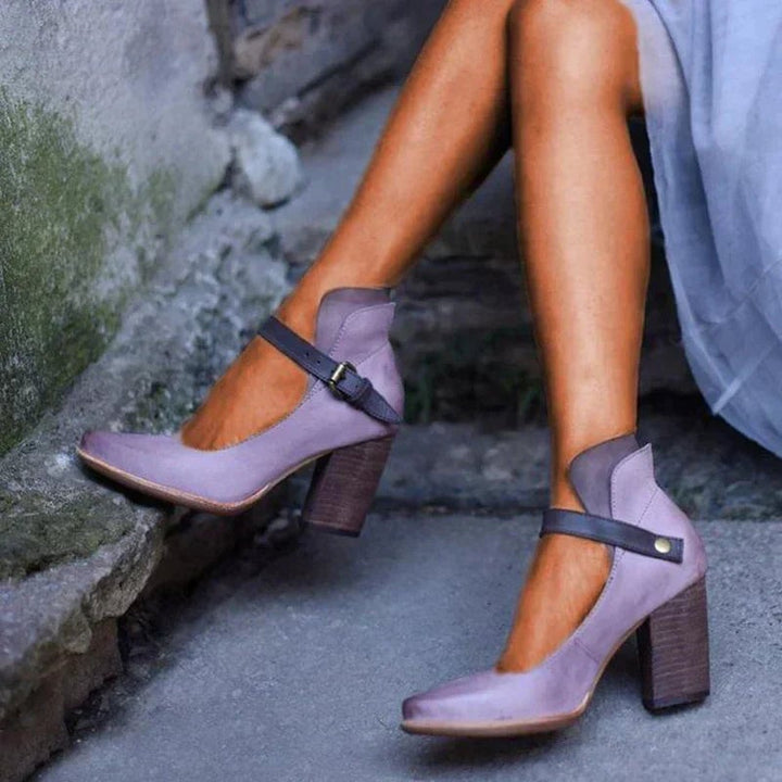 Women's elegant strappy heel sandals with adjustable ankle straps in a neutral colorway, side view