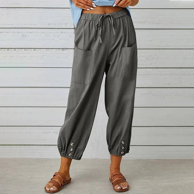Model wearing BobaFashion relaxed high waist pants paired with a simple top, showcasing the elongated leg silhouette