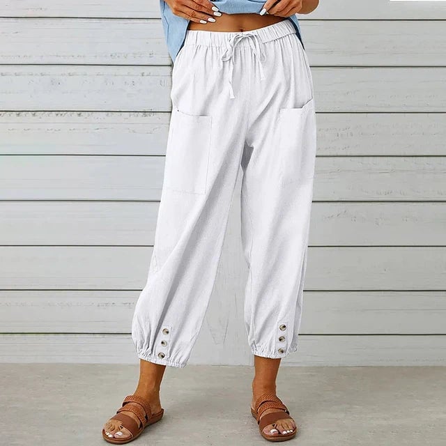 BobaFashion Lena pants in a dark color option, worn by a female model in a casual everyday outfit