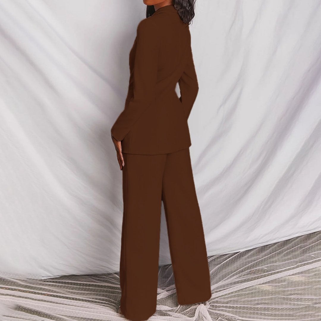 Blue colorway of the BobaFashion chic blazer and matching trousers set on a model