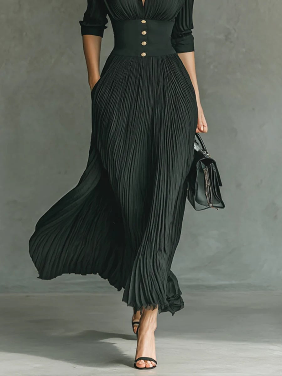 Black belted lapel maxi dress styled for a formal occasion, full-length back view