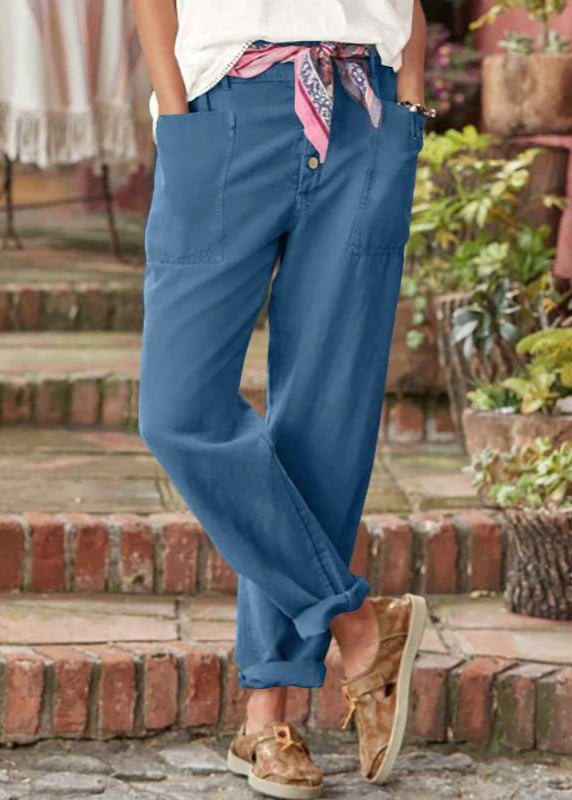 Model styled in BobaFashion relaxed trousers paired with a casual blouse for a breezy summer look