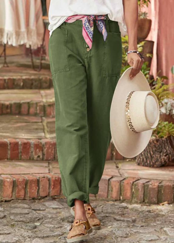 Full-length view of model in BobaFashion elegant relaxed trousers on a breezy outdoor setting