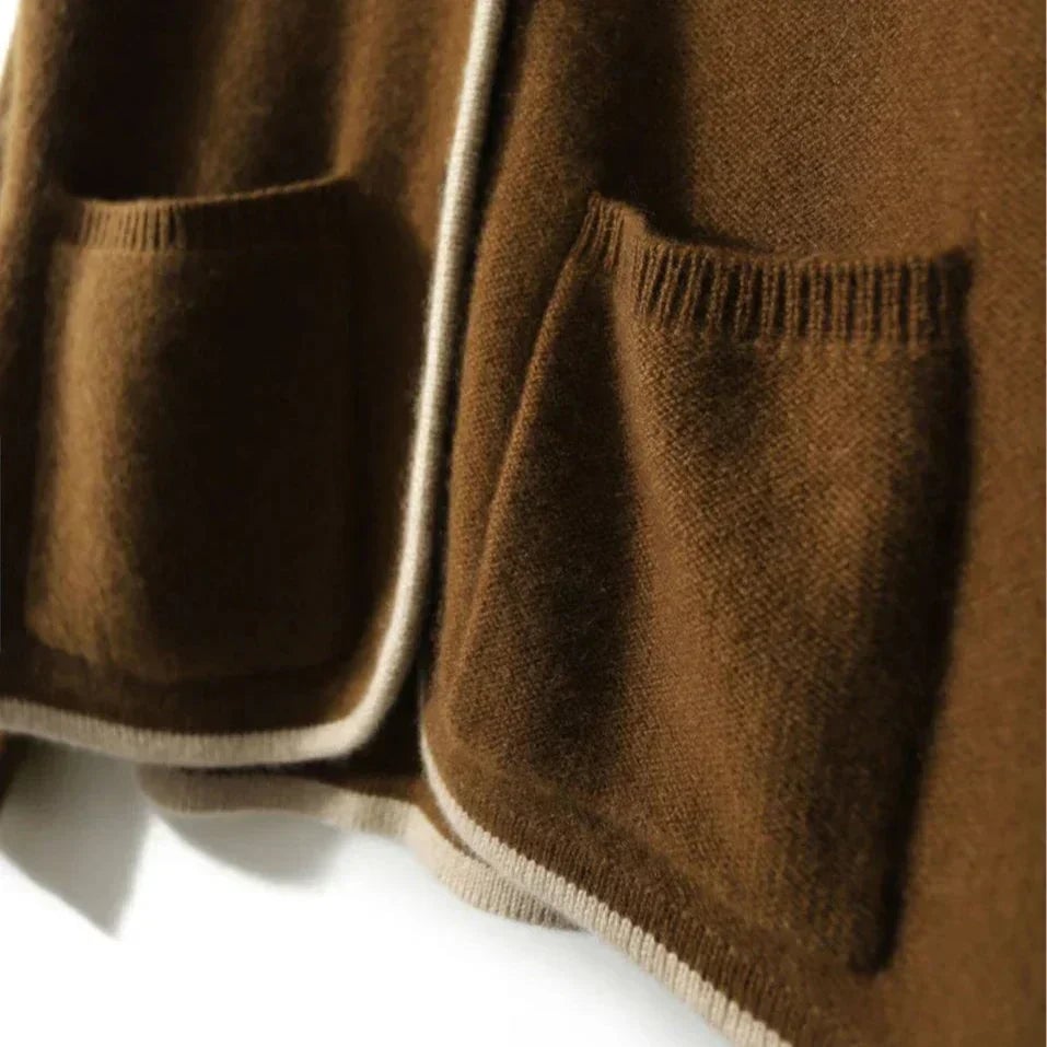 Back view of the Londyn vintage cardigan in beige highlighting the flattering relaxed silhouette
