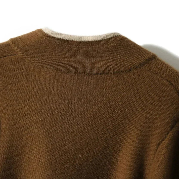 Full-length shot of the Londyn vintage cardigan in brown worn over a white tee and denim