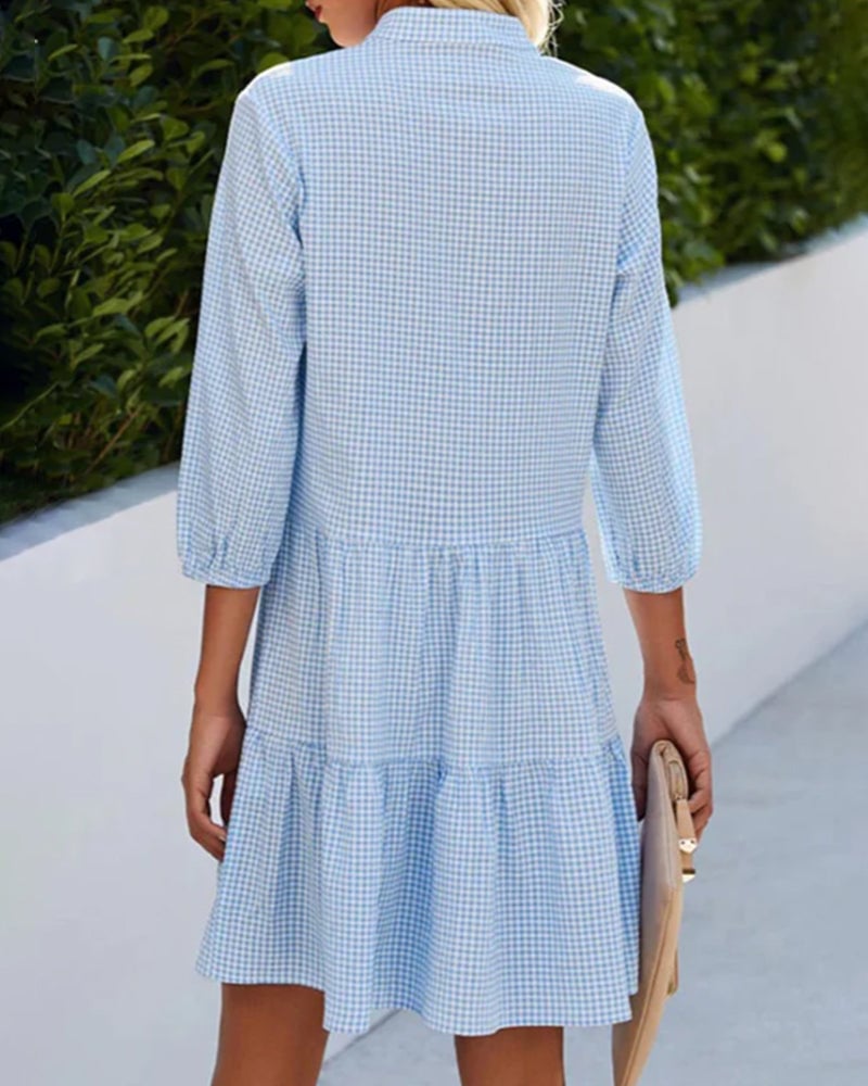 Close-up of the Lorraine Summer Check Dress highlighting the front button-down neckline and lightweight check fabric