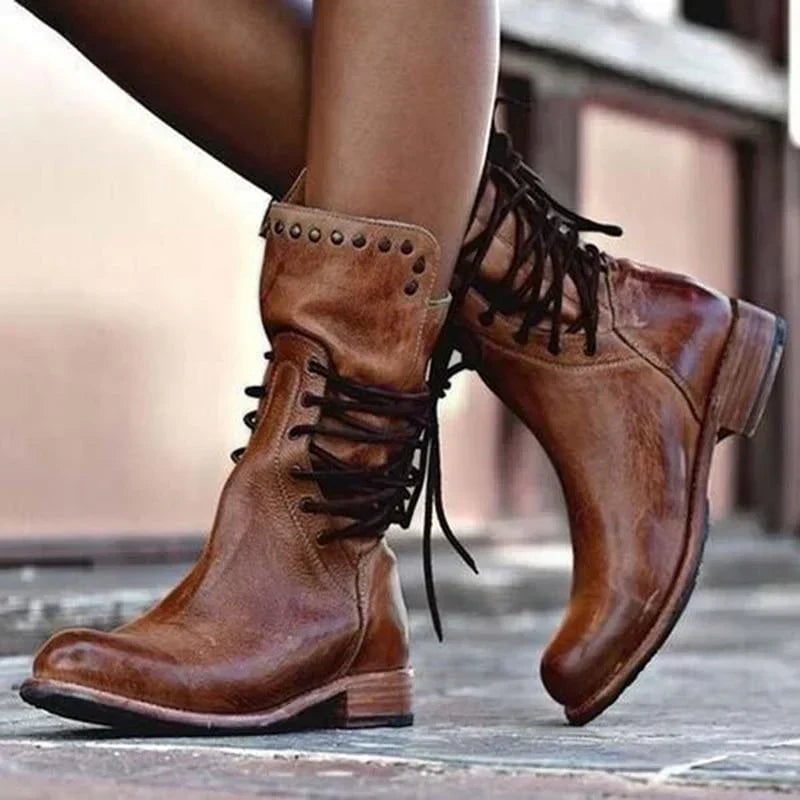 Luth stylish leather boots in brown with a smooth ankle-to-mid-calf silhouette, shown from the front