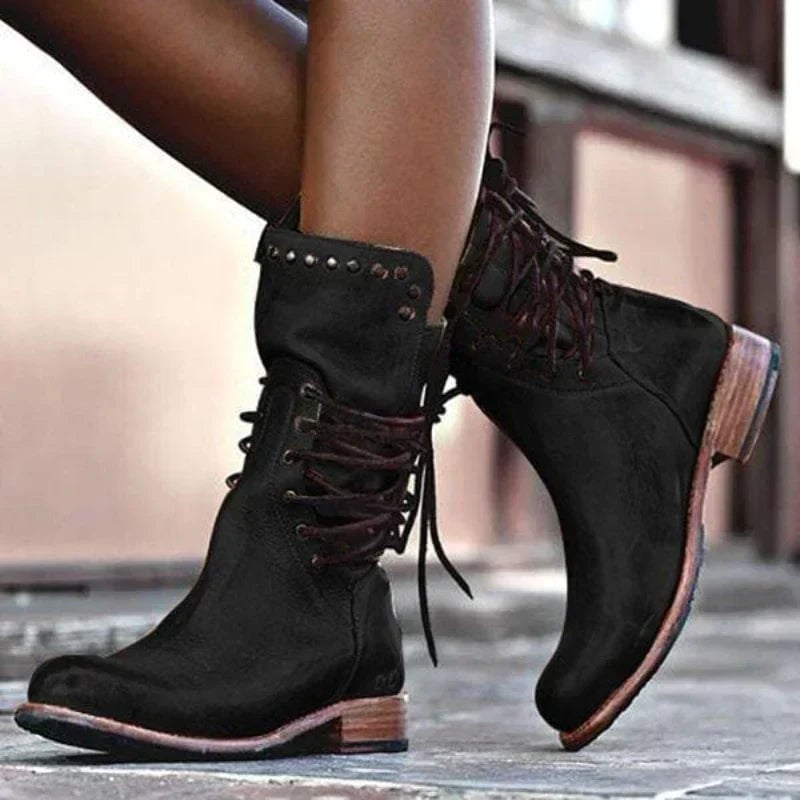 Luth leather boots styled with jeans, showcasing the leg-lengthening effect and sleek design