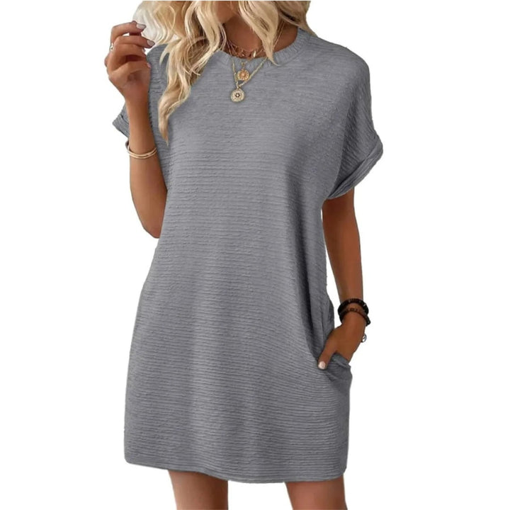 Detail shot of the rolled sleeve cuff on the Maggie t-shirt mini dress in Light Pink